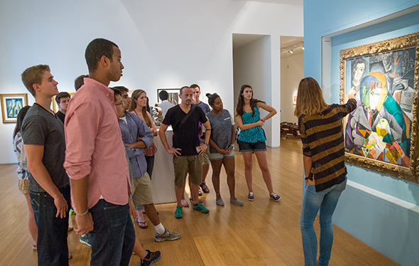 Students in a Spanish Language Study Abroad program get a private tour of the permanent collection in the Museum of Latin American Art of Buenos Aires. (Photo by Eli Burakian ’00)