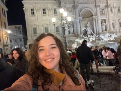 Nina Sloan in front of the Trevi fountain in Rome.